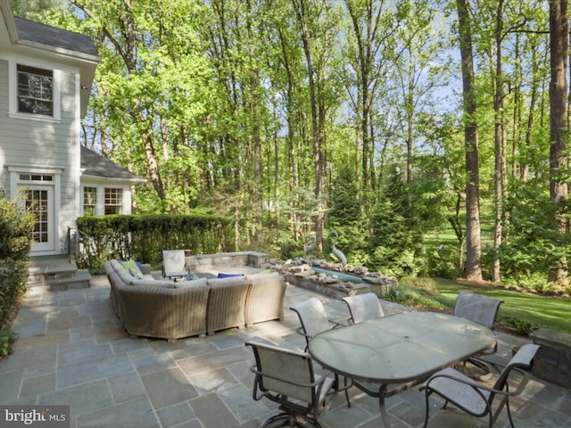 view of patio / terrace featuring outdoor dining area and outdoor lounge area