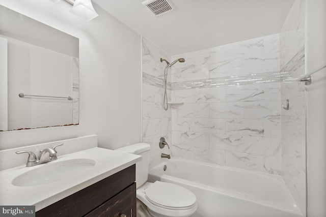 full bath with toilet, visible vents, washtub / shower combination, and vanity