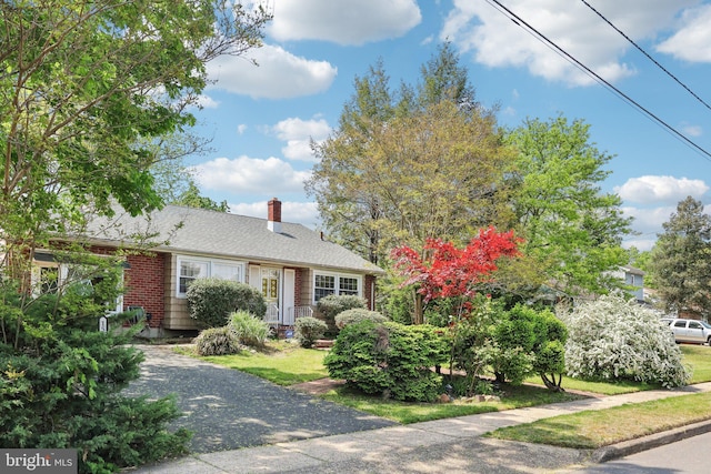 1511 Glenview Dr, Cinnaminson, NJ 08077 - view of front of home with a chimney