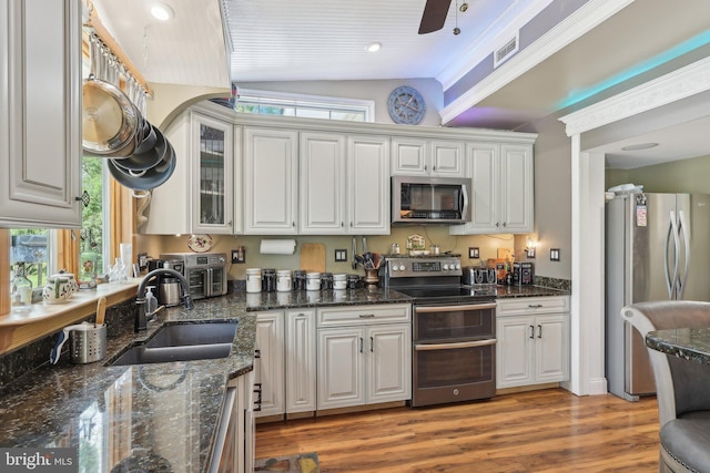 1511 Glenview Dr, Cinnaminson, NJ 08077 - kitchen with stainless steel appliances, a sink, lofted ceiling, and white cabinetry