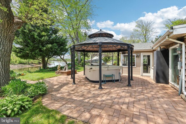 1511 Glenview Dr, Cinnaminson, NJ 08077 - view of patio / terrace featuring a hot tub, a gazebo, and a water view