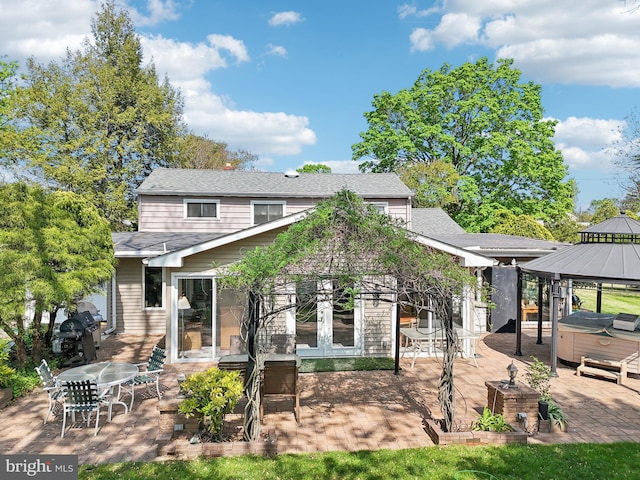 1511 Glenview Dr, Cinnaminson, NJ 08077 - back of house featuring a hot tub, a patio area, french doors, and roof with shingles