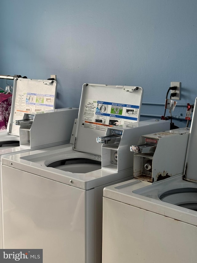 900 Kennedy Dr Unit 304, North Wildwood, NJ 08260 - clothes washing area with separate washer and dryer and laundry area