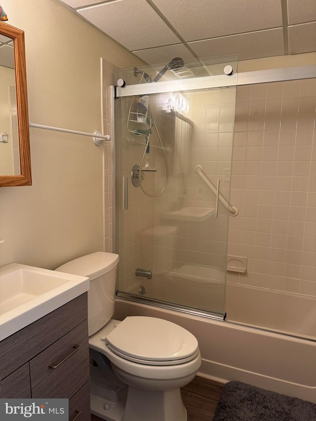 900 Kennedy Dr Unit 304, North Wildwood, NJ 08260 - full bath with bath / shower combo with glass door, wood finished floors, vanity, and toilet