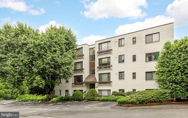 3825 Davis Pl NW Unit 202, Washington, DC 20007 - view of apartment building / complex with uncovered parking