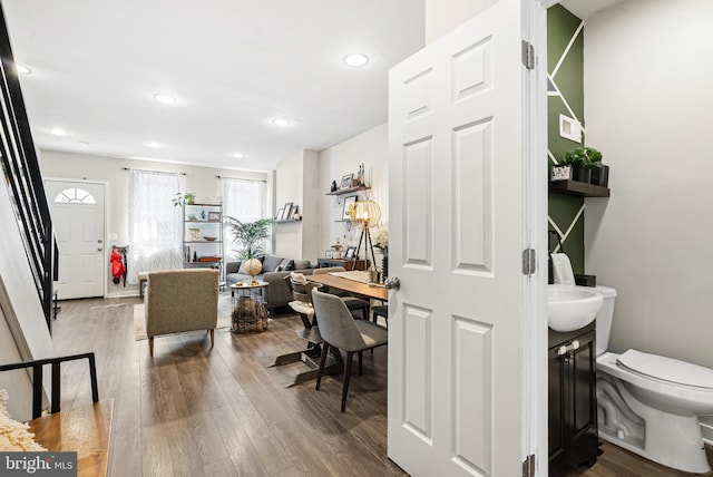 interior space featuring recessed lighting and wood finished floors