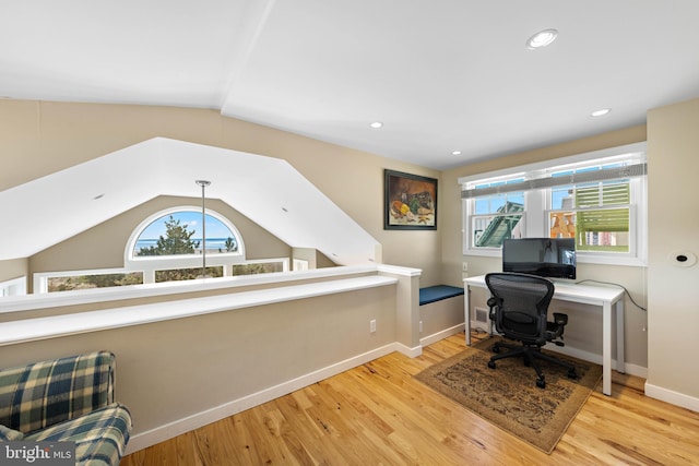 office space with baseboards, recessed lighting, wood finished floors, and vaulted ceiling