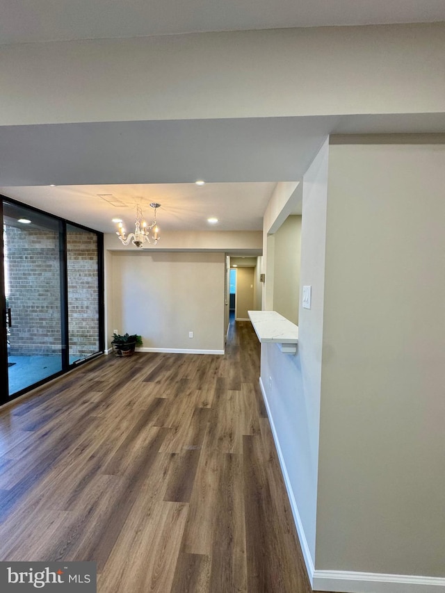 511 N Armistead St Unit T2, Alexandria, VA 22312 - unfurnished dining area with baseboards, recessed lighting, dark wood-style flooring, and a notable chandelier