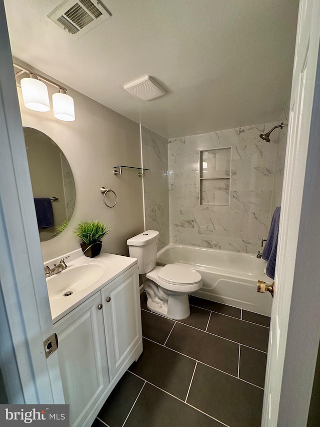 511 N Armistead St Unit T2, Alexandria, VA 22312 - bathroom featuring visible vents, tile patterned flooring, vanity, toilet, and shower / bathing tub combination