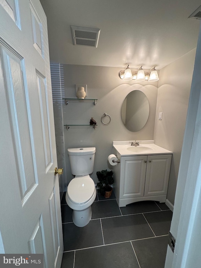 511 N Armistead St Unit T2, Alexandria, VA 22312 - bathroom featuring toilet, tile patterned floors, visible vents, and vanity