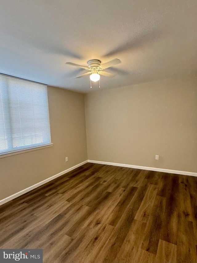 511 N Armistead St Unit T2, Alexandria, VA 22312 - unfurnished room featuring ceiling fan, dark wood-style floors, and baseboards