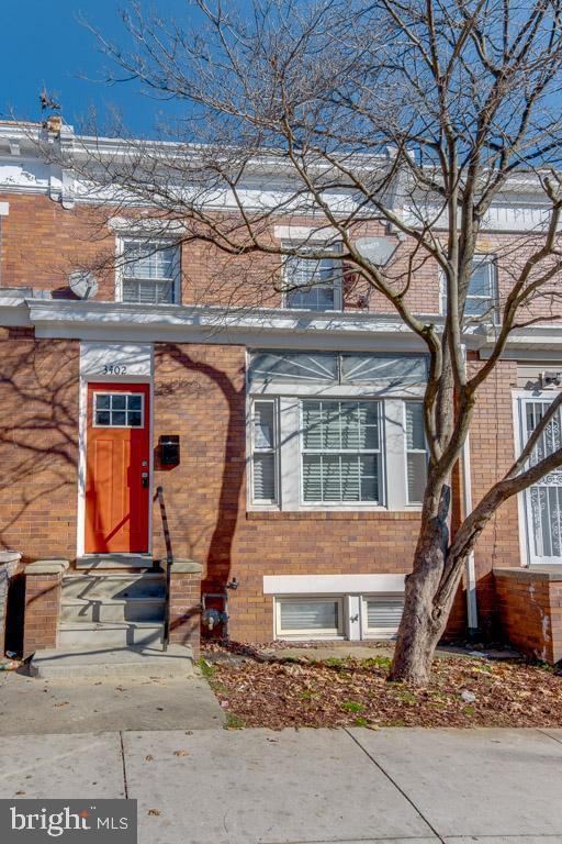 view of front of home featuring brick siding and entry steps
