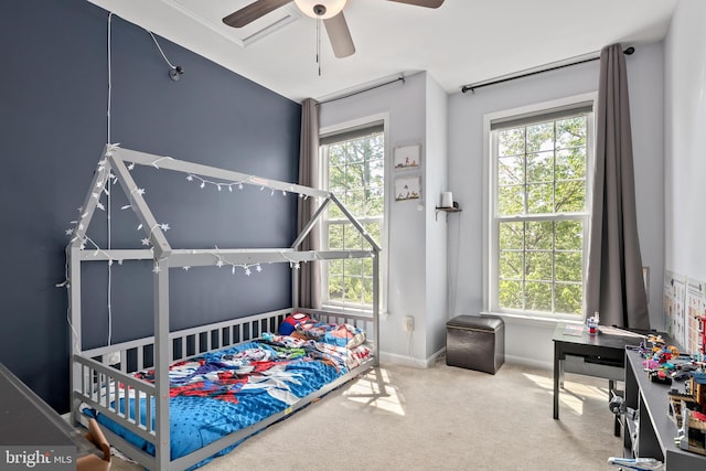 bedroom featuring baseboards, carpet flooring, and ceiling fan