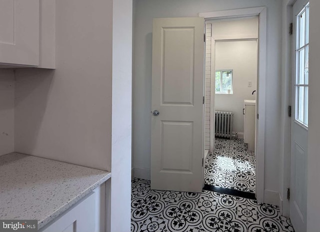 16 E Parkway Ave, Chester, PA 19013 - bathroom with radiator heating unit and tile patterned floors