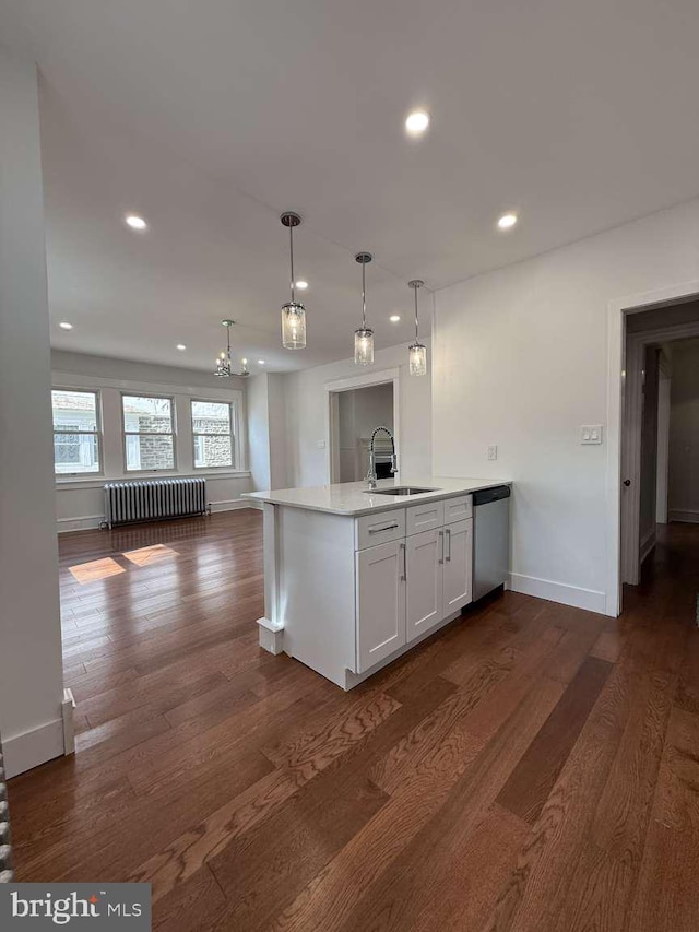 16 E Parkway Ave, Chester, PA 19013 - kitchen with stainless steel dishwasher, a sink, baseboards, radiator, and recessed lighting