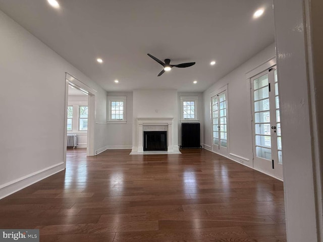 16 E Parkway Ave, Chester, PA 19013 - unfurnished living room featuring recessed lighting, ceiling fan, dark wood finished floors, and radiator