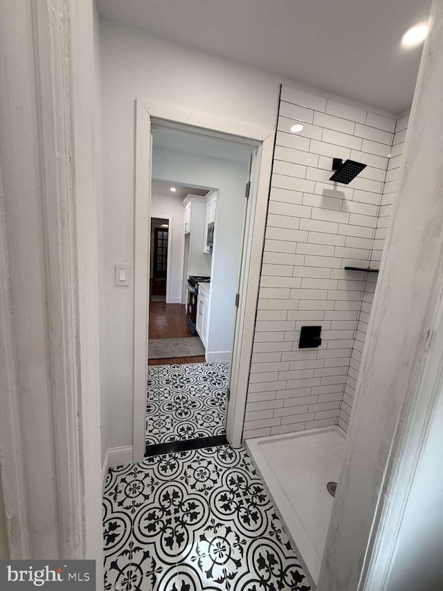16 E Parkway Ave, Chester, PA 19013 - bathroom featuring baseboards, recessed lighting, and a stall shower