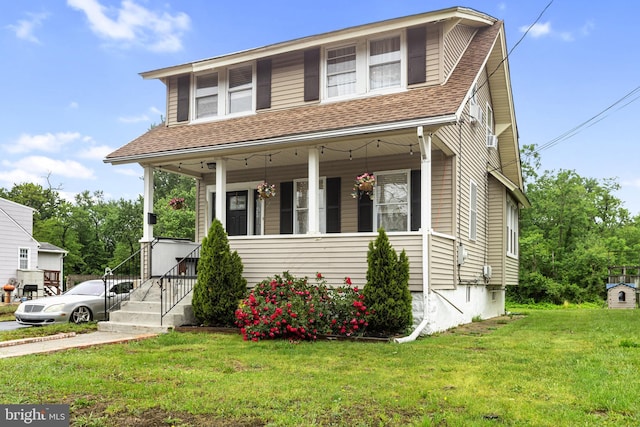 821 Green Ave, Mount Ephraim, NJ 08059 - view of front of home featuring a shingled roof, a porch, and a front lawn