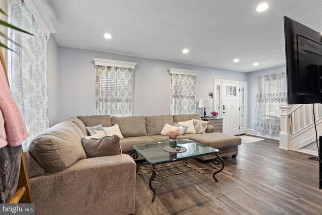 821 Green Ave, Mount Ephraim, NJ 08059 - living area with a textured ceiling, wood finished floors, recessed lighting, and baseboards