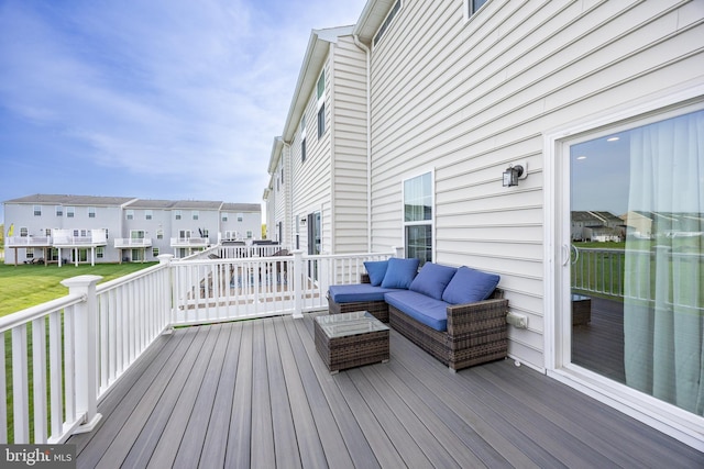 deck featuring outdoor lounge area and a residential view