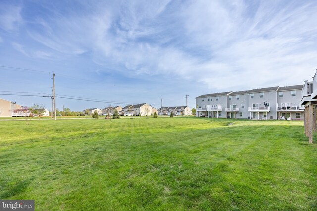 view of yard featuring a residential view