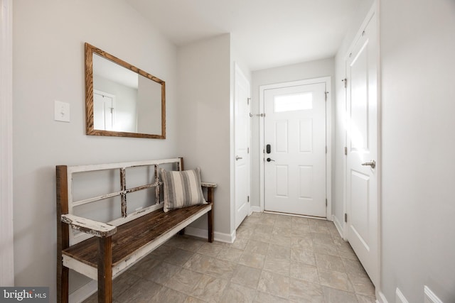 doorway with baseboards