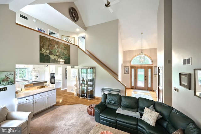 6 Pond Ridge Ln, Hanover, PA 17331 - living room featuring high vaulted ceiling, light wood-style floors, healthy amount of natural light, and a ceiling fan