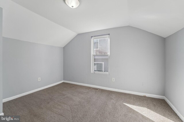 7113 Carriage Hill Dr, Laurel, MD 20707 - bonus room featuring carpet, visible vents, lofted ceiling, and baseboards