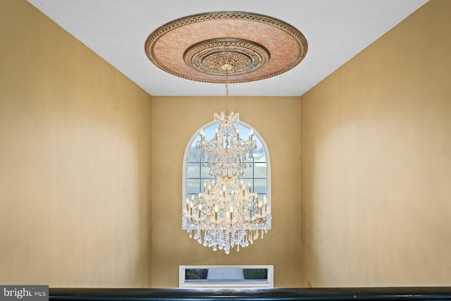 details featuring an inviting chandelier