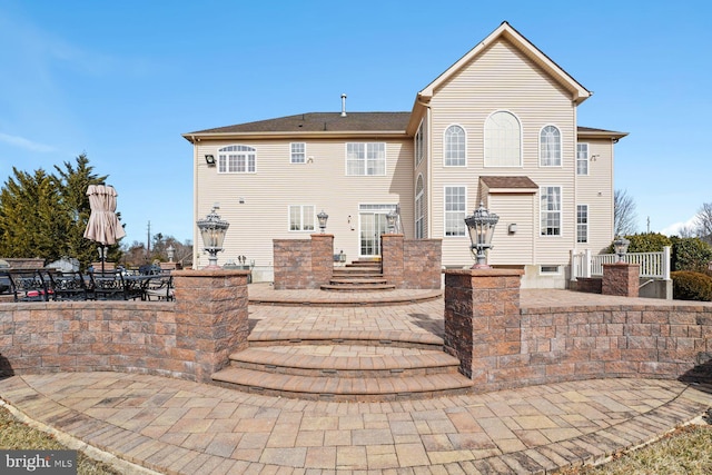back of house featuring a patio