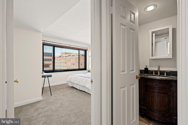 1077 30th St NW Unit 612, Washington, DC 20007 - carpeted bedroom with a sink and baseboards