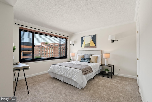 1077 30th St NW Unit 612, Washington, DC 20007 - carpeted bedroom with ornamental molding, a textured ceiling, and baseboards