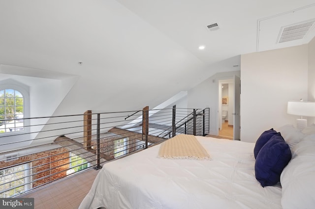 515 N Washington St Unit 404, Alexandria, VA 22314 - bedroom featuring lofted ceiling, recessed lighting, and visible vents