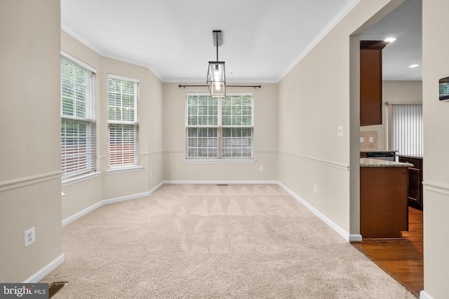 17202 Madrillon Way, Accokeek, MD 20607 - unfurnished dining area featuring crown molding and carpet floors