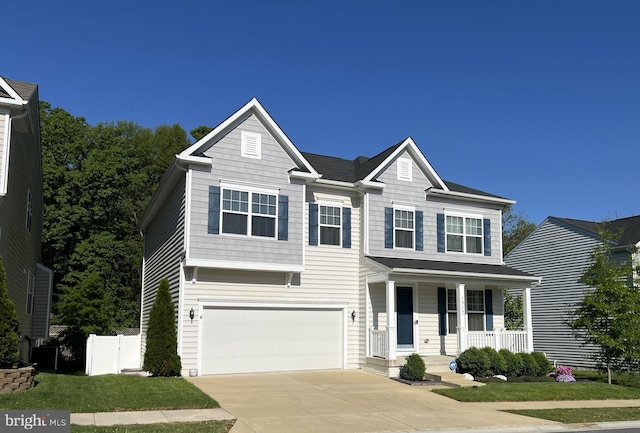 7928 Meridian Dr, Pasadena, MD 21122 - view of front of house featuring covered porch, a garage, concrete driveway, and fence