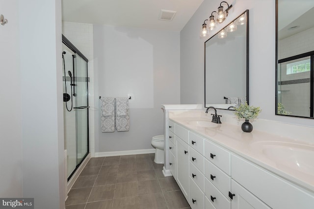 7928 Meridian Dr, Pasadena, MD 21122 - bathroom with a stall shower, baseboards, double vanity, and toilet