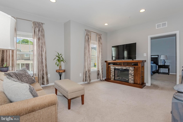 7928 Meridian Dr, Pasadena, MD 21122 - living room featuring recessed lighting, a glass covered fireplace, carpet, and baseboards
