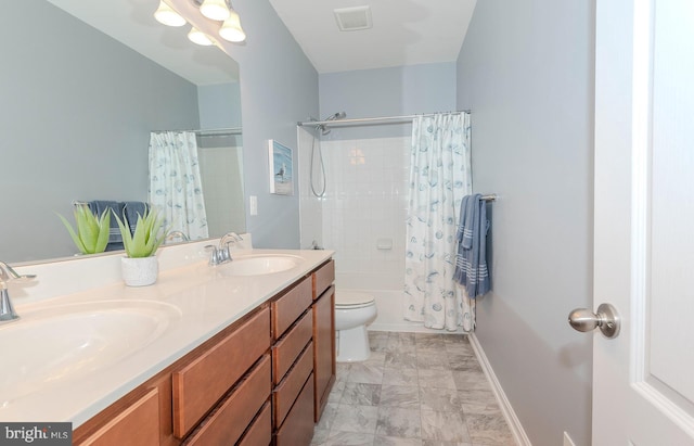 7928 Meridian Dr, Pasadena, MD 21122 - bathroom with double vanity, shower / bath combo with shower curtain, toilet, marble look tiles, and baseboards
