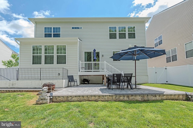 7928 Meridian Dr, Pasadena, MD 21122 - rear view of house featuring a patio and a gate