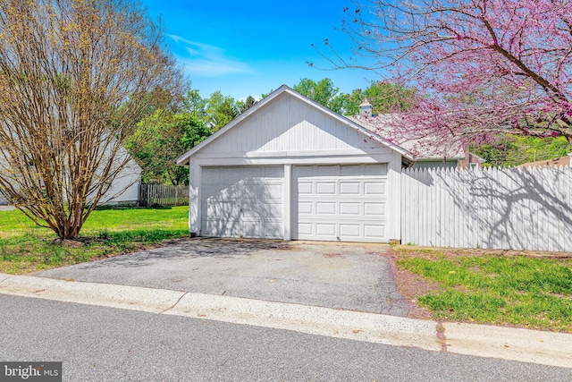 garage featuring fence