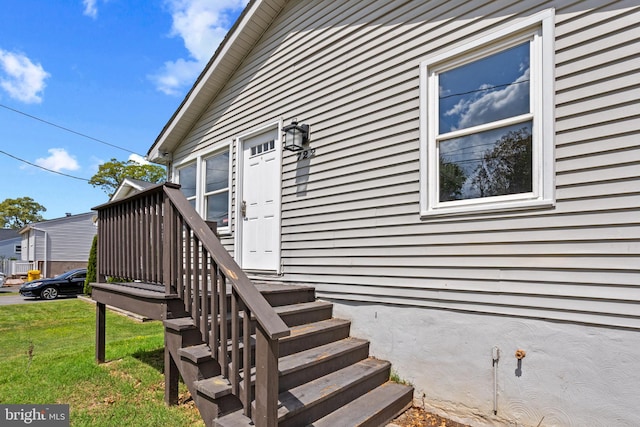 722 210th St, Pasadena, MD 21122 - property entrance with a lawn
