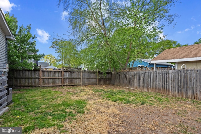 722 210th St, Pasadena, MD 21122 - view of yard featuring a fenced backyard