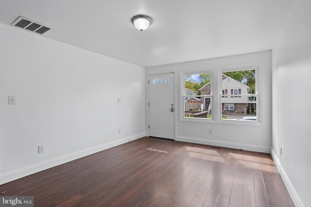 722 210th St, Pasadena, MD 21122 - entryway featuring baseboards, dark wood finished floors, and visible vents