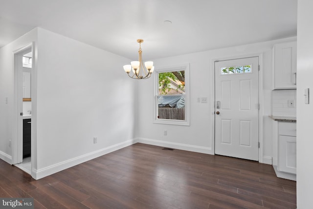 722 210th St, Pasadena, MD 21122 - foyer entrance with an inviting chandelier, baseboards, dark wood-style floors, and visible vents