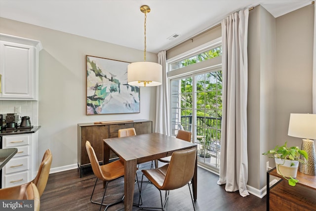 324 Jefferson Ave Unit 25, Downingtown, PA 19335 - dining area featuring baseboards, visible vents, and dark wood-type flooring