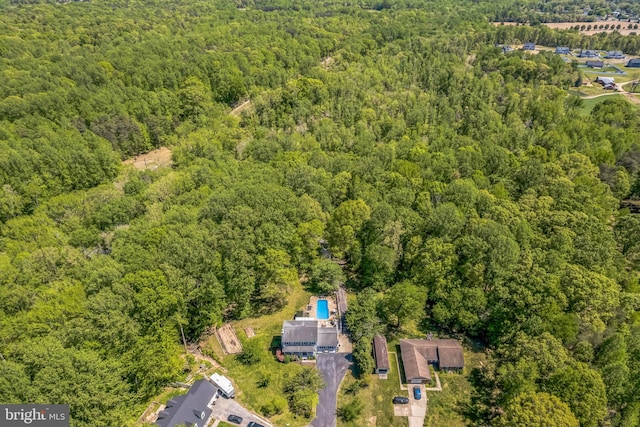 bird's eye view featuring a view of trees