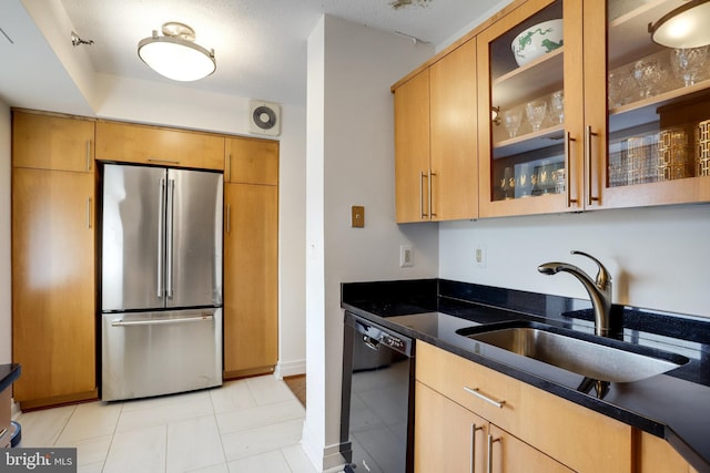 900 Stafford St N Unit 2222, Arlington, VA 22203 - kitchen with glass insert cabinets, freestanding refrigerator, light tile patterned floors, dishwasher, and a sink