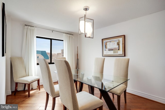 900 Stafford St N Unit 2222, Arlington, VA 22203 - dining room with baseboards and light wood-style floors