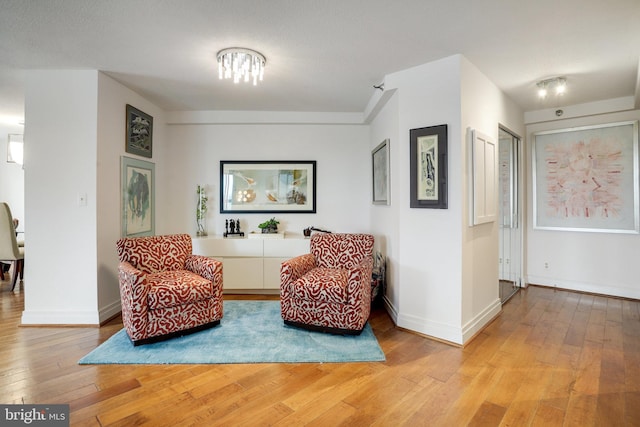 900 Stafford St N Unit 2222, Arlington, VA 22203 - sitting room with light wood-style floors and baseboards
