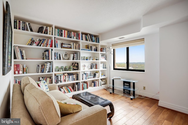 900 Stafford St N Unit 2222, Arlington, VA 22203 - sitting room featuring hardwood / wood-style floors, baseboards, and visible vents
